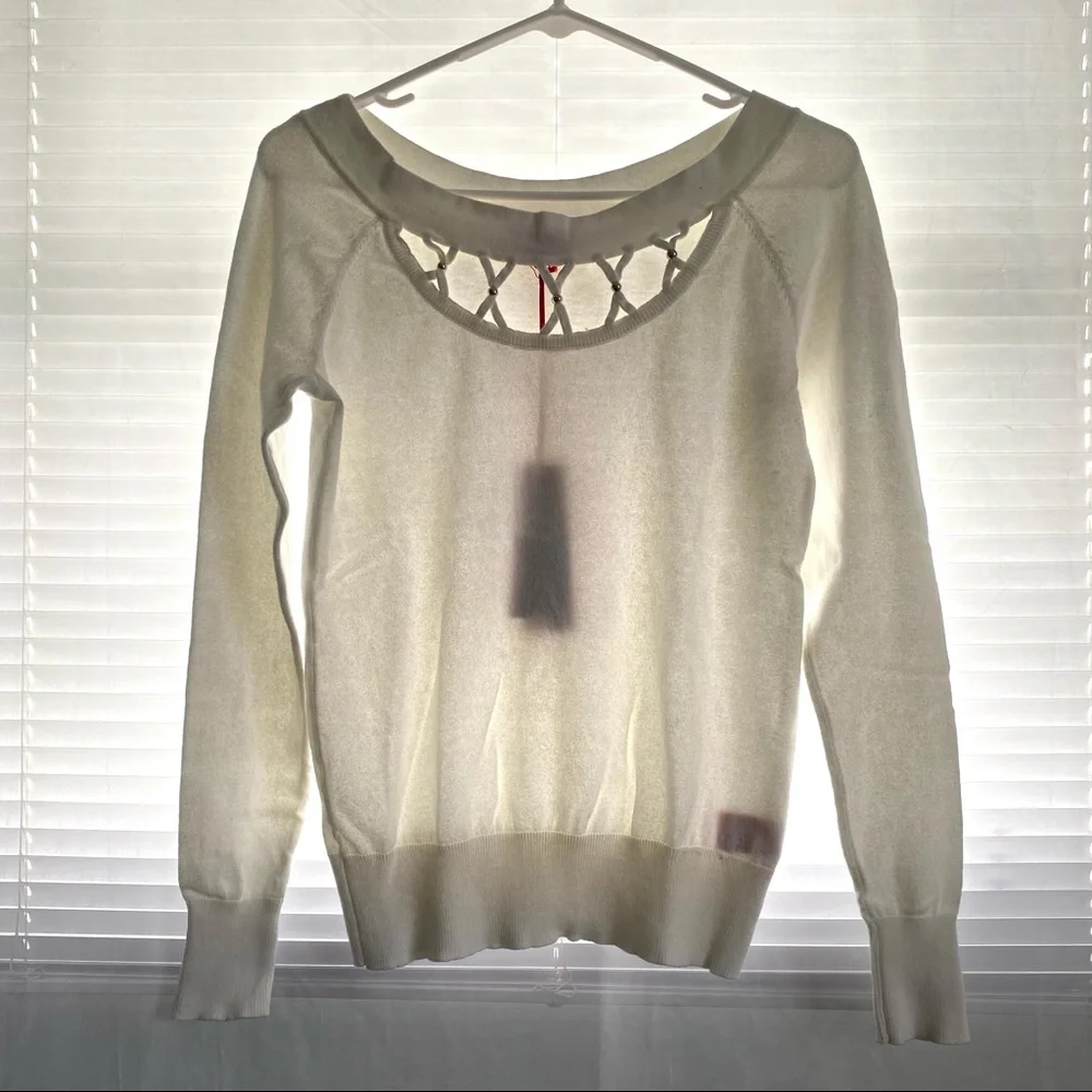 Jennifer Lopez Criss Cross Cut Out Off-White Sweater - Picture 3 of 12